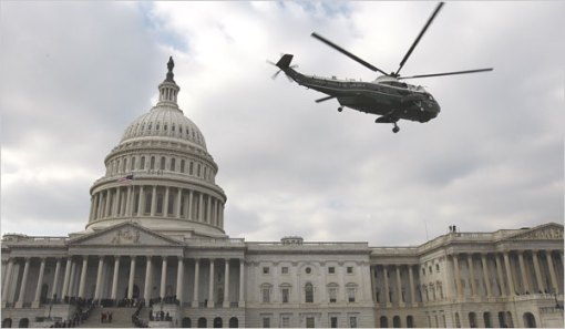 George W. Bush leaves the Capitol via helicopter Tuesday.